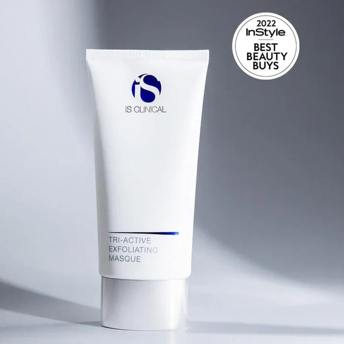 White tube of iS Clinical Tri-Active Exfoliating Masque with blue logo on grey background