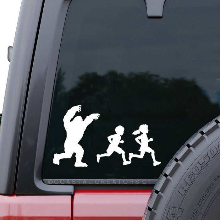 Bigfoot Chasing Kids White Vinyl Window Decal