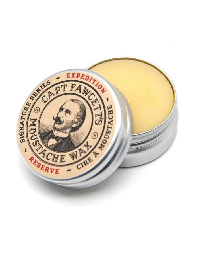 Open Captain Fawcett moustache wax tin showing yellow wax inside