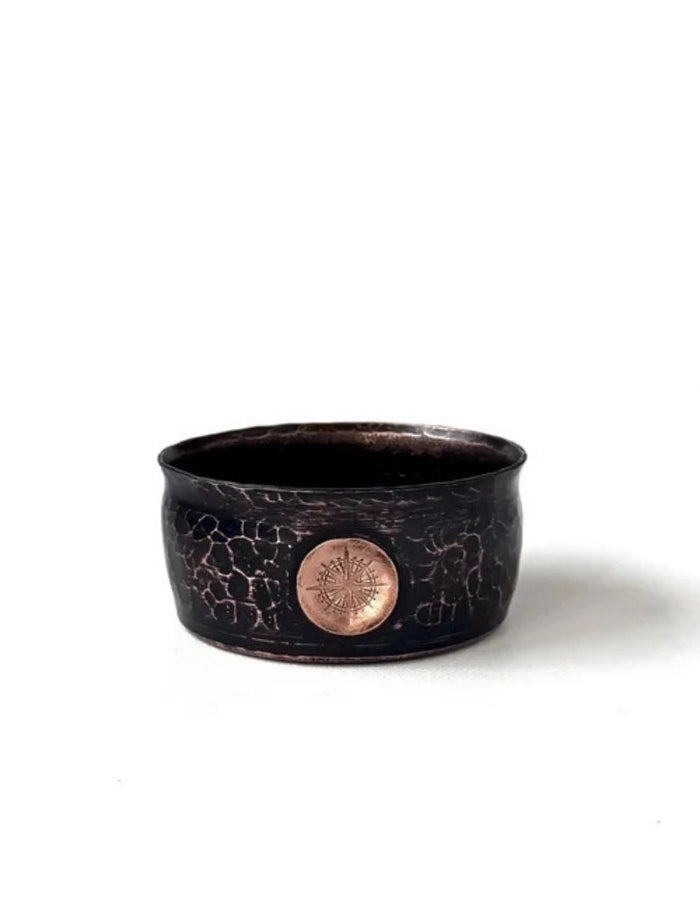 Obsidian-colored copper lather bowl with hammered finish and copper emblem on front, designed for wet shaving, SKU: CAPTAINSCCOPPEROBSIDIANTRVL