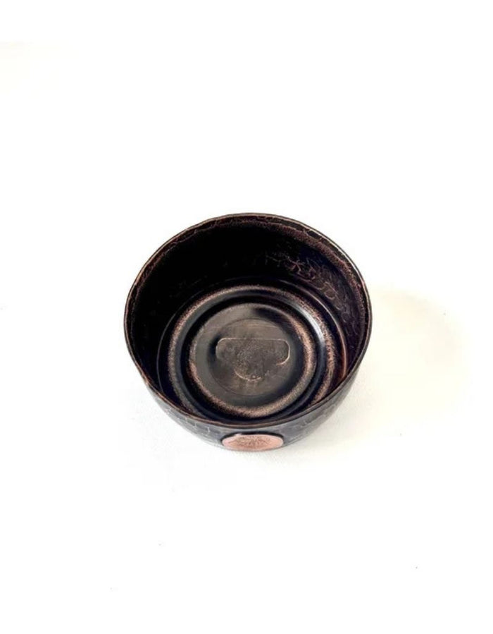 Top-down view of copper lather bowl showing interior with hammered finish and copper emblem, perfect for wet shavers, SKU: CAPTAINSCCOPPEROBSIDIANTRVL