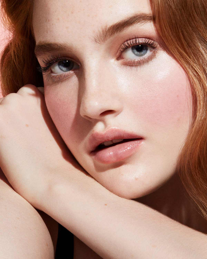 Cheeks Out Freestyle Cream Blush light model shown in shade Drama Cla$$