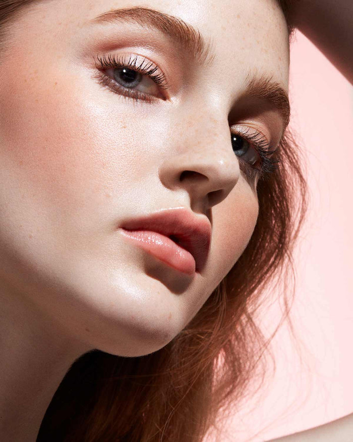 Cheeks Out Freestyle Cream Blush light model shown in shade Rose Latte