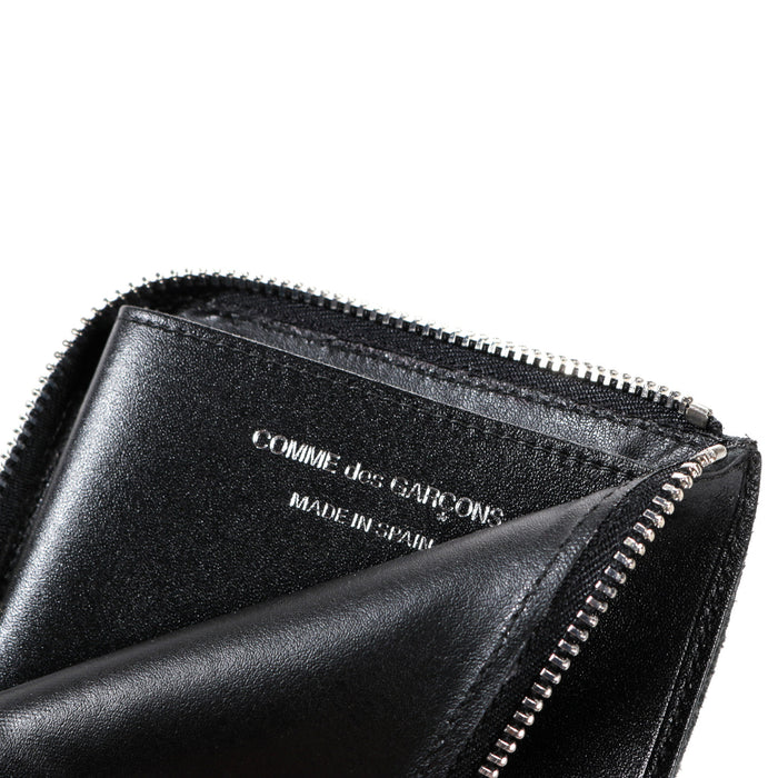COMME DES GARCONS SA3100 SILVER EYELET ZIP WALLET BLACK