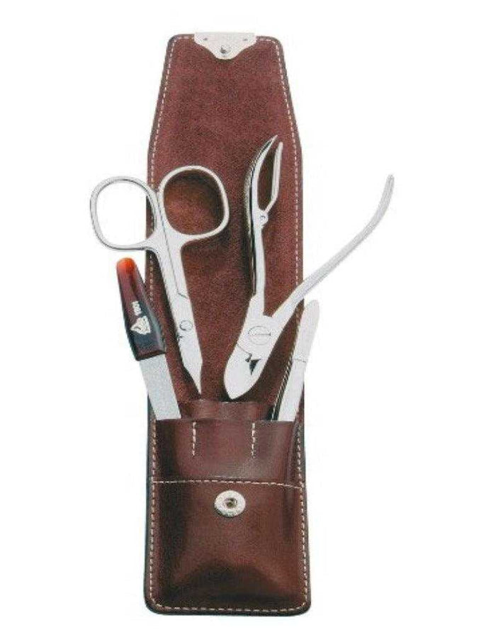 Leather manicure set case with grooming tools