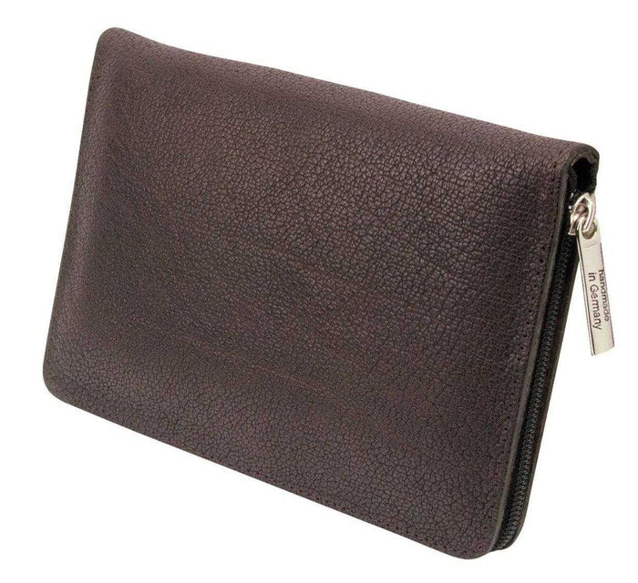Leather manicure tool case with scissors and nail tools