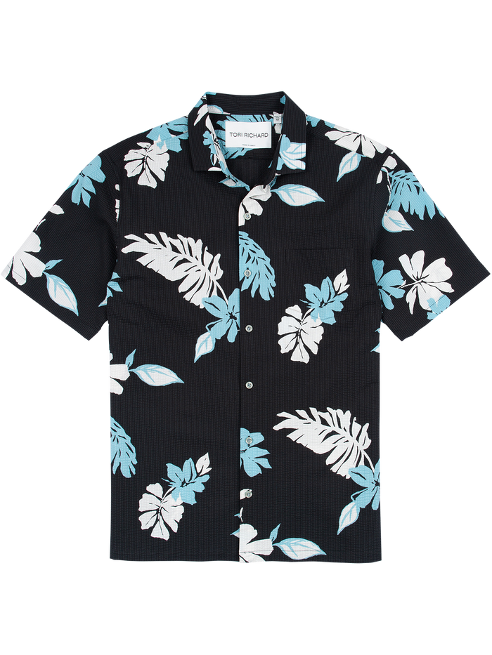 Black short-sleeve shirt with blue and white tropical leaf print, shown from front in flat lay.
