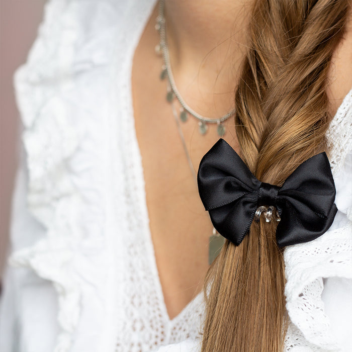 INVISIBOBBLE Bowtique True Black spiral hair ring meets bow