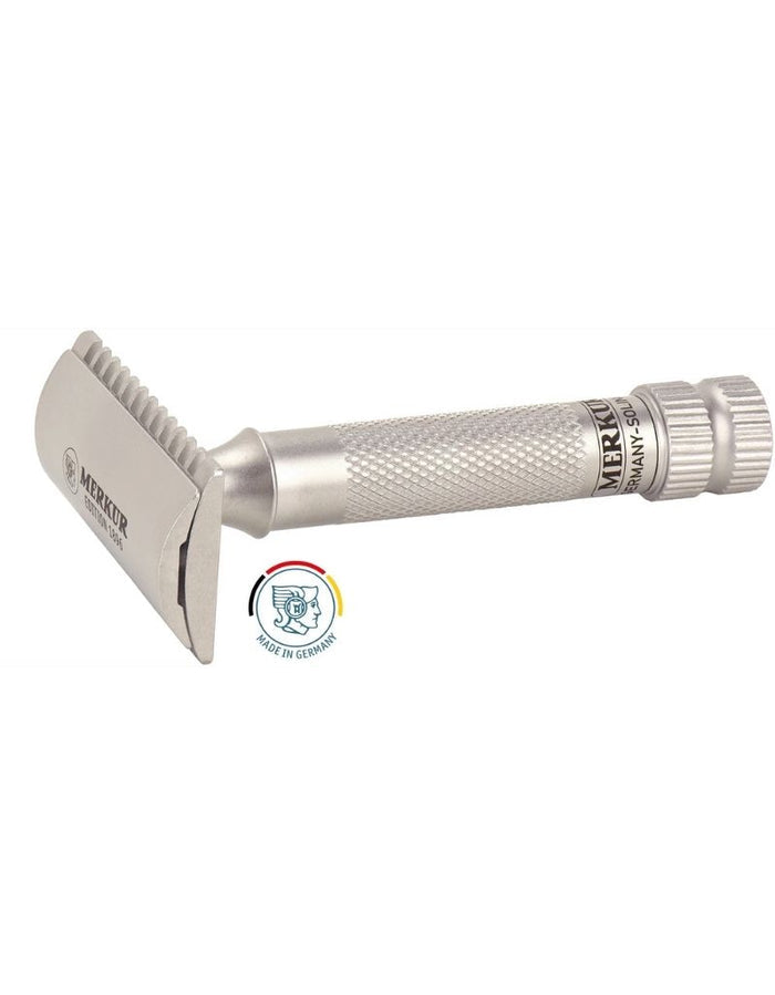 Merkur stainless steel safety razor with textured handle, disassembled with protective cap and packaging, made in Germany for grooming.