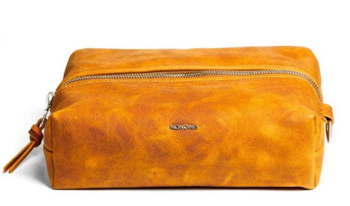 Nokona leather toiletry bag with zipper and logo detail