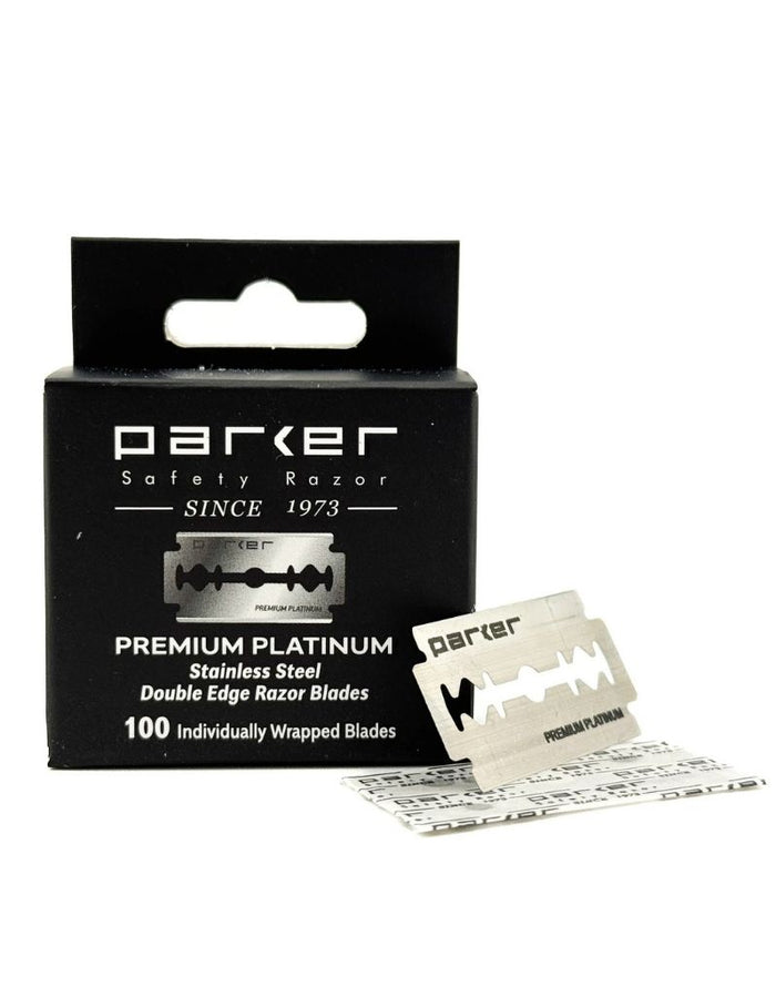 Parker Premium Platinum double edge 100 blades, showing the black retail packaging box alongside two individually wrapped silver stainless steel razor blades on a white background.