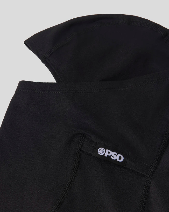 Black underwear with PSD brand label and stitched seams on light gray background.