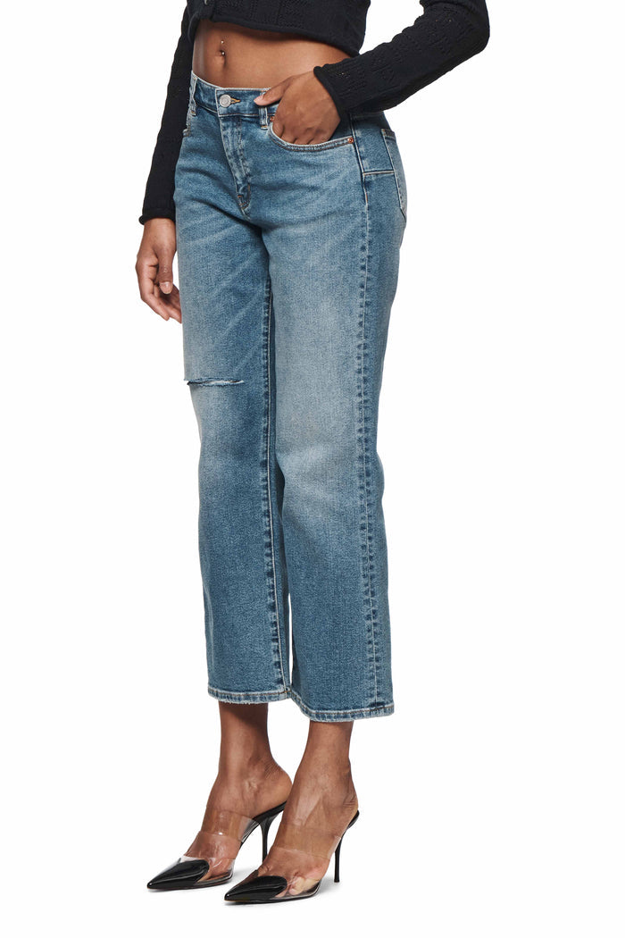 Slim Crop 80's denim in medium indigo wash with distressed details and cropped straight leg.