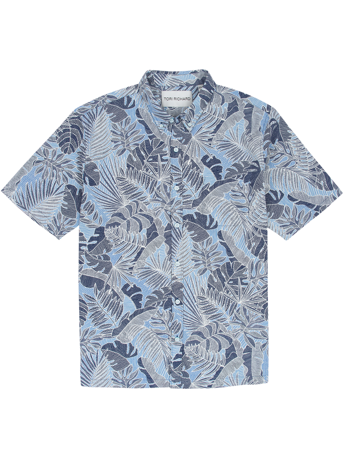 Blue and white leaf-pattern short-sleeve shirt, front view, with UPF fabric detail. Flat lay.