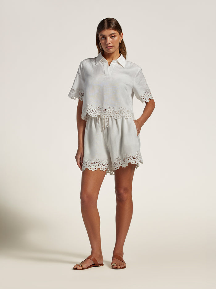 Yellow linen Naia short set with scalloped lace hems and embroidery, full front view.