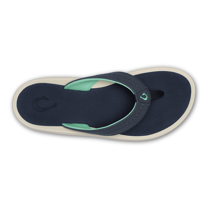 Navy and mint flip-flop sandal with cream sole and adjustable toe strap.